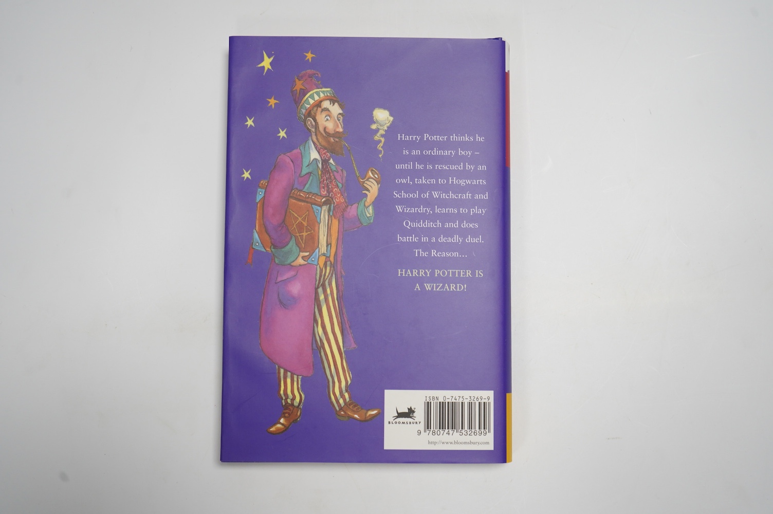 Rowling, J. K. - Harry Potter and the Philosopher's Stone. First Edition (reprinted). armorial half and title pages. publisher's coloured pictorial boards and d/wrapper. Bloomsbury, (?1999)